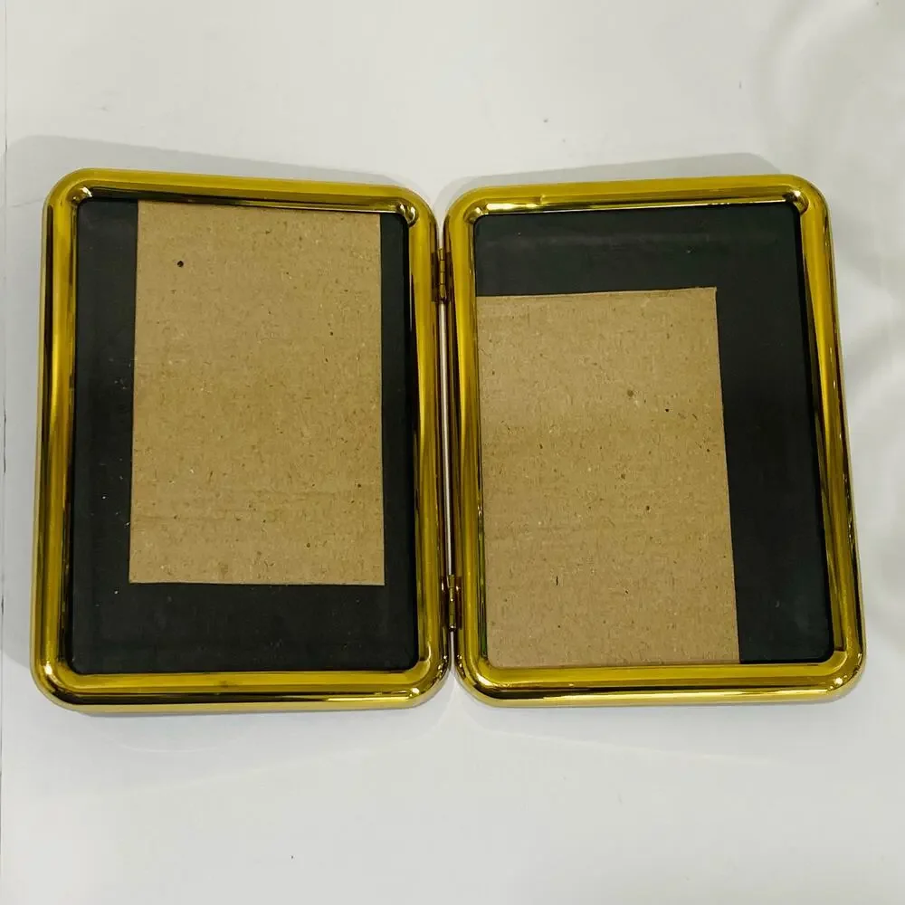 Vintage 1980's double brass photo frame free standing book style holds two 5 x 7